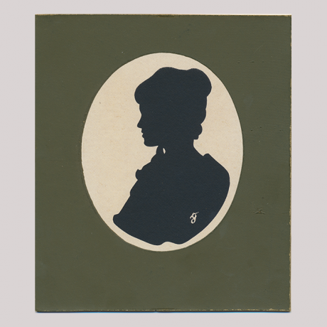 
        Front of silhouette, with woman in frame looking left.